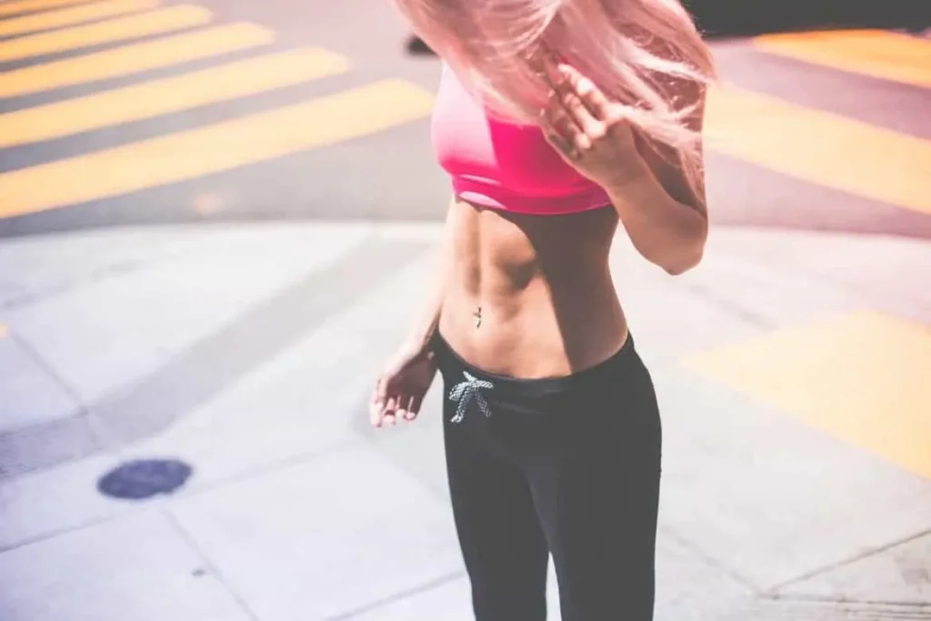 Woman with toned stomach after LA-EMS Body Sculpting Treatment Maidstone